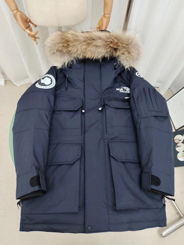 The North Face Summit Series White Duck Down Parkas