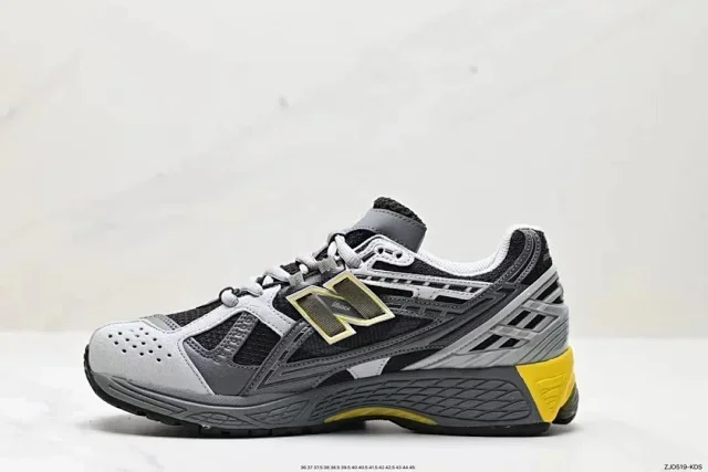 New Balance Athletic Shoes (Gray/Black Upper, Yellow Accents, N Logo)