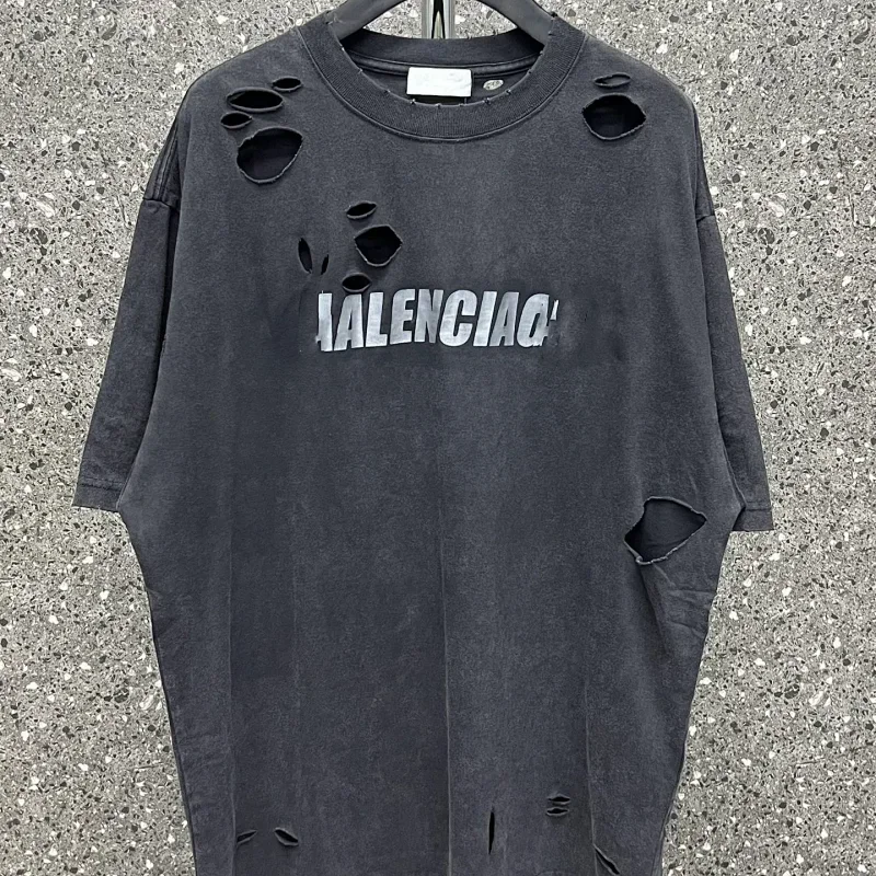 Balenciaga Distressed Logo Oversized T-Shirt