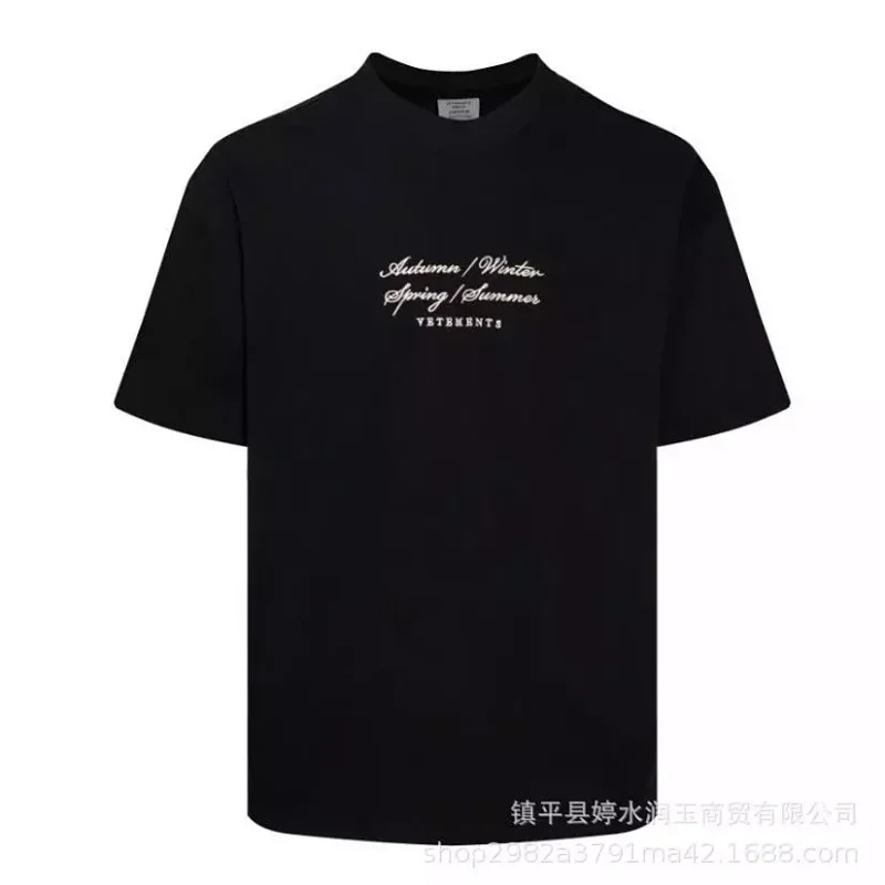 VETEMENTS Black T-Shirt with Seasonal Text Print