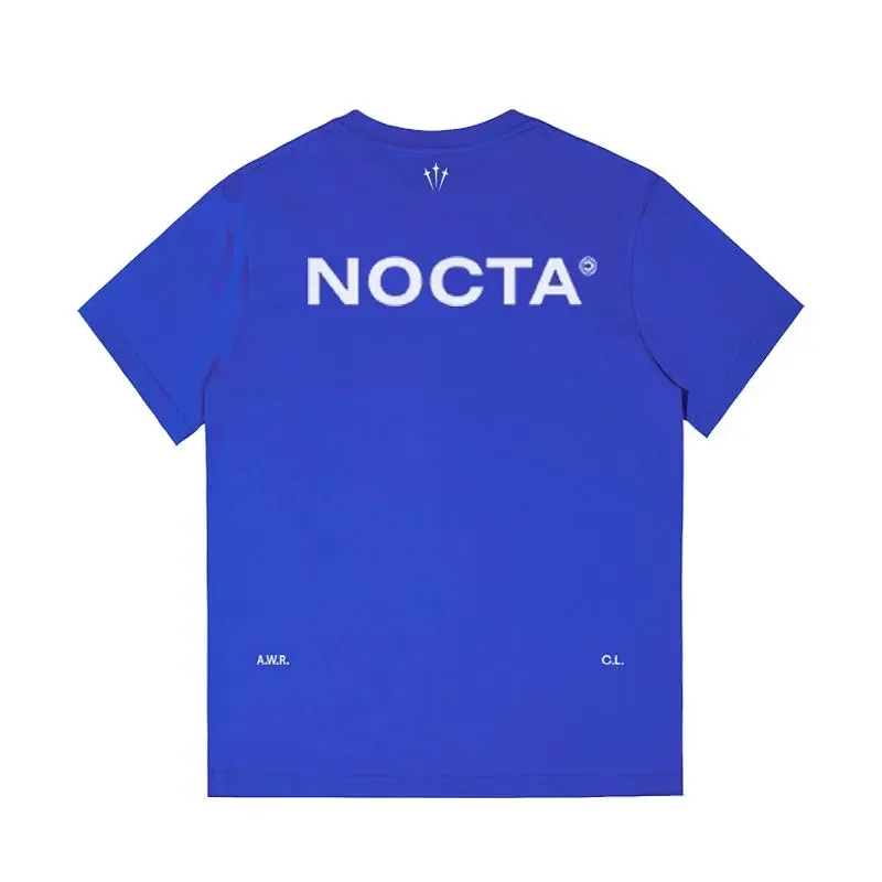 NOCTA Blue T-Shirt with Logo and Back Text