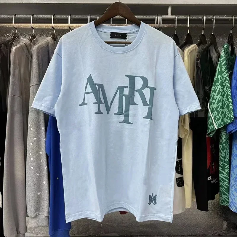 AMIRI Light Blue T-Shirt with Letter Print